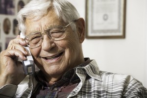 Senior man talking on telephone