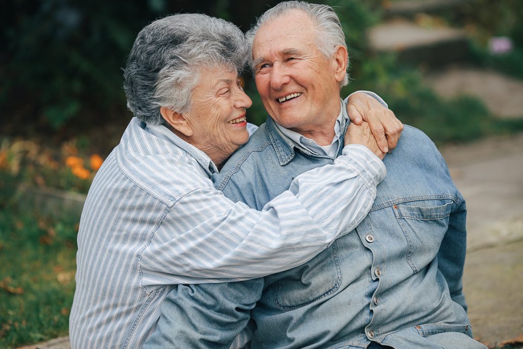 Old couple spending time together in a park