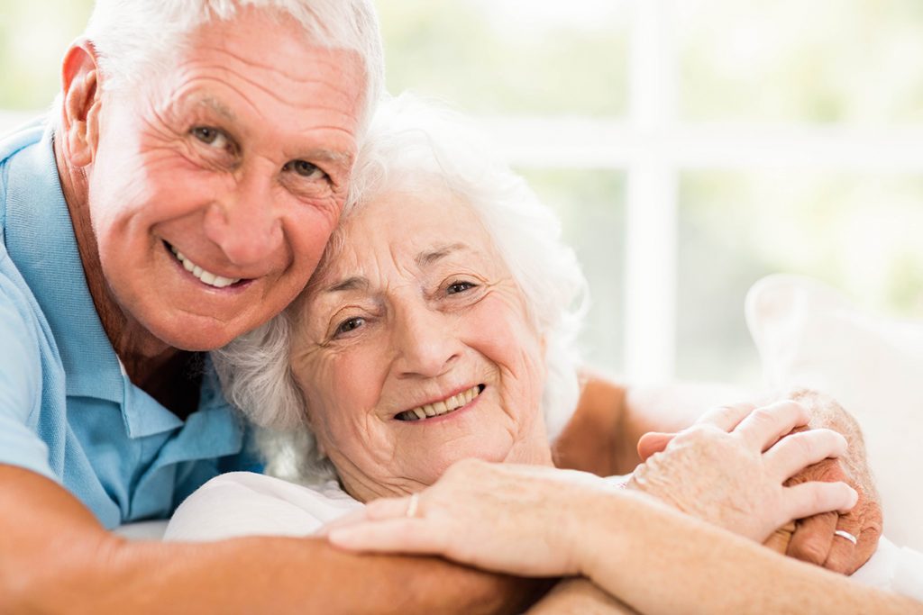 older couple hugging