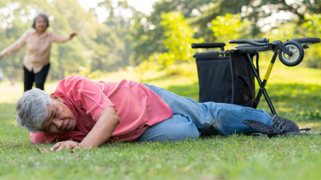 man lying on the grass after falling