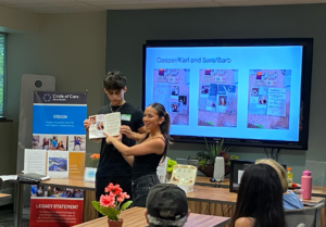 "Students Cooper and Sara present journal at Legacy Showcase"