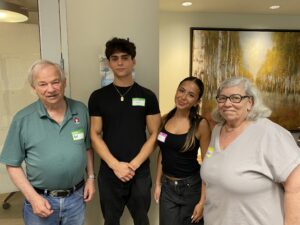 "Students Cooper and Sara with Senior Couple Karl and Barbara"