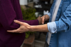 "hands holding each other support"